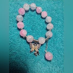 Pink white aurora silvertone butterfly beads stretch bracelet